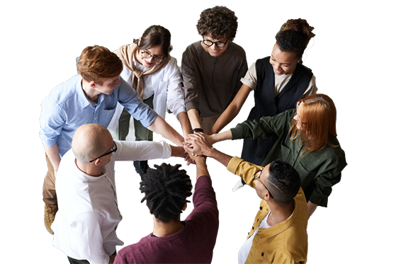Group of diverse professionals collaborating and joining hands in a teamwork setting.