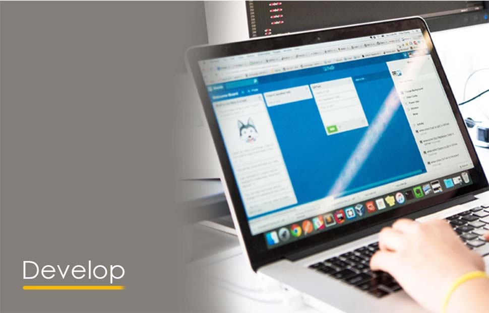 Person typing on a laptop, focusing on development plans and data migration.