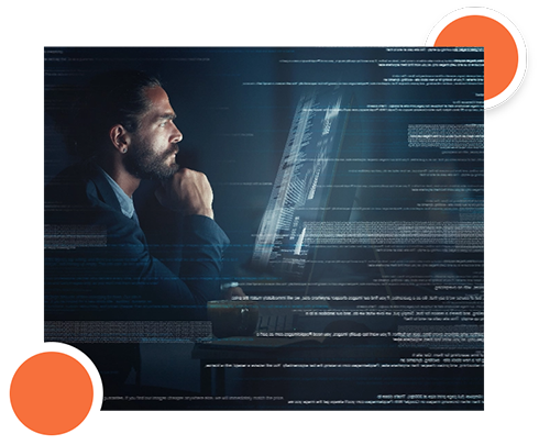 A man thoughtfully looking at a computer screen with code and data overlays.