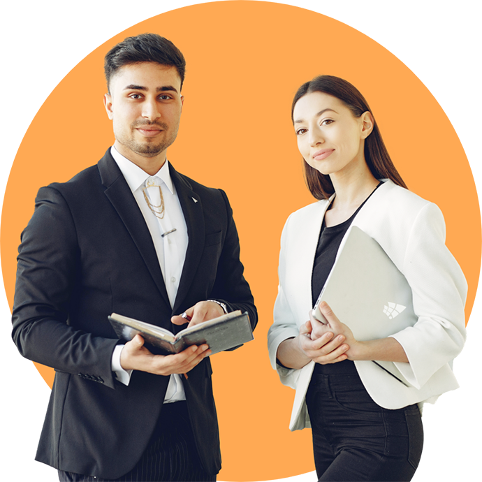 Two professionals standing together, smiling, against a bright orange background.