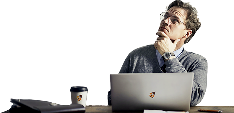 Business professional using TechnicaX on a laptop to enhance customer relationships with Dynamics 365 CE, sitting thoughtfully at a desk with a tablet, coffee cup, and a closed briefcase.